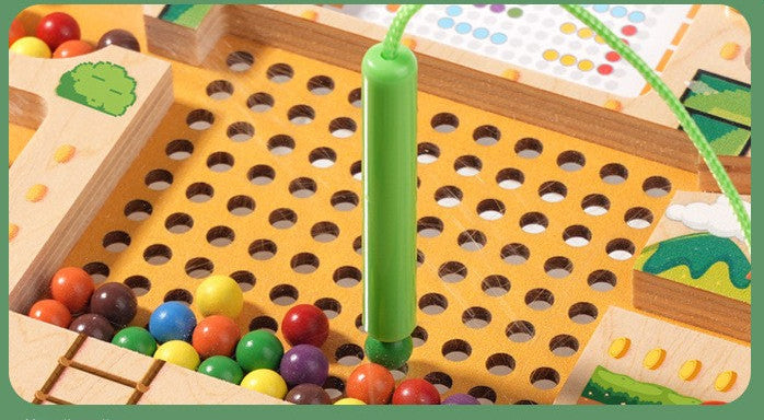 Jouet sensoriel en bois avec billes magnétiques pour enfants atypiques