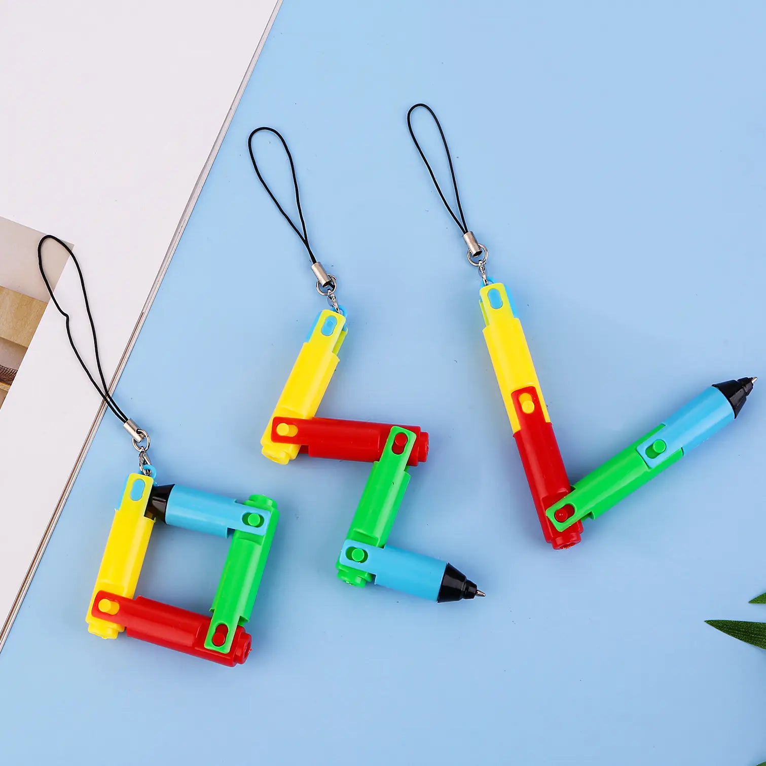 Stylo ludique déformable avec lanière pour apprentissage amusant